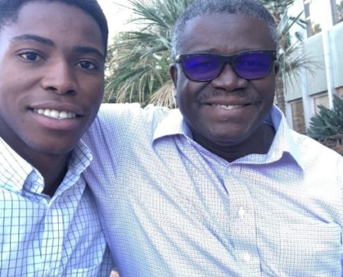 Stephen Meda Jr. with a family member